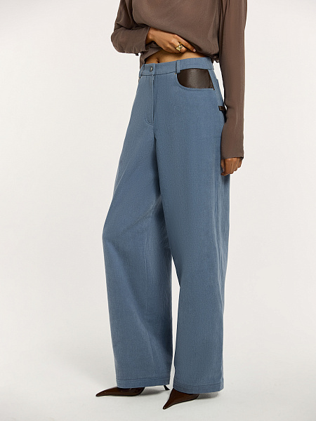 Брюки с отделкой из натуральной кожи