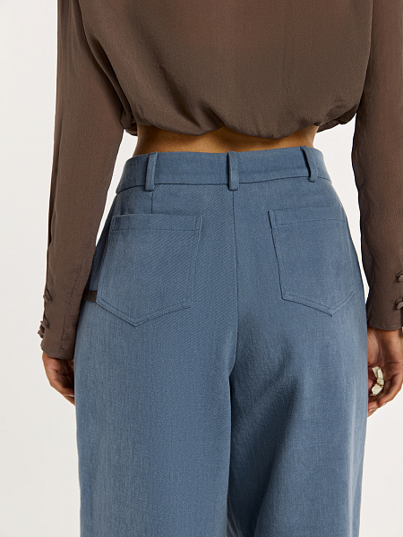 Брюки с отделкой из натуральной кожи